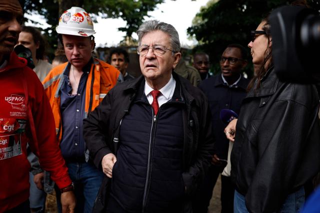 Founder of French left-wing party La France Insoumise (LFI) and presidential candidate Jean-Luc Melenchon arrives at the esplanade des Invalides outside the National Assembly, France's lower house of parliament, during a demonstration in support of the nationalisation of steelmaking giant ArcelorMittal, called by the General Confederation of Labour (CGT), as the bill comes before the National Assembly in Paris on June 11, 2026. (Photo by SIMON WOHLFAHRT / AFP)