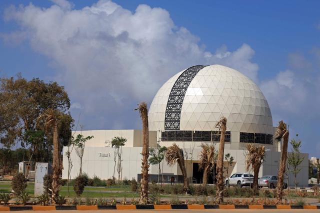 This photograph shows a view of the main administration building of the University of Benghazi, in Benghazi on May 20, 2026. A decade after fierce battles reduced much of the University of Benghazi to rubble, students at Libya's oldest and largest university are once again looking to the future with optimism. The university, founded in 1955, had become after the 2011 uprisings that toppled and killed longtime ruler Muammar Gaddafi the stage of intense fightings between jihadist groups and forces led by military strongman Khalifa Haftar. (Photo by Abdullah DOMA / AFP) / To go with 'Libya-Youth-Development-Education', REPORTAGE by Françoise KADRI