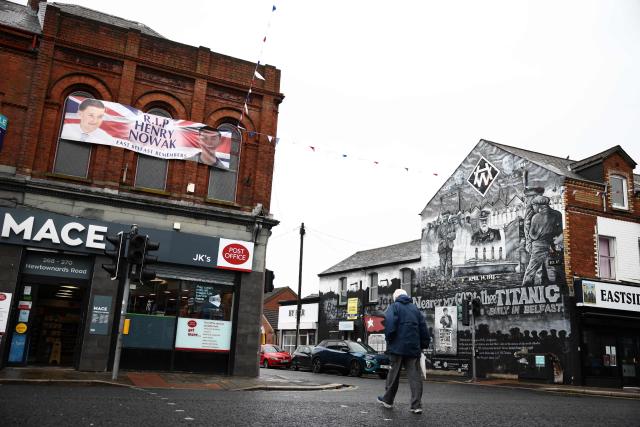 A poster in remembrance of stabbing victim Henry Nowak, killed in Southampton in December 2025, is pictured in Newtownards, east of Belfast, Northern Ireland, on June 11, 2026, following two consecutive nights of violence following the June 8 stabbing of Stephen Ogilvie, that triggered the unrest. Police arrested 16 people during a second night of disorder on June 10, in Northern Ireland sparked by the brutal Belfast stabbing of Stephen Ogilvie, a senior minister said Thursday, condemning rioters for "racist thuggery". (Photo by Henry NICHOLLS / AFP)
