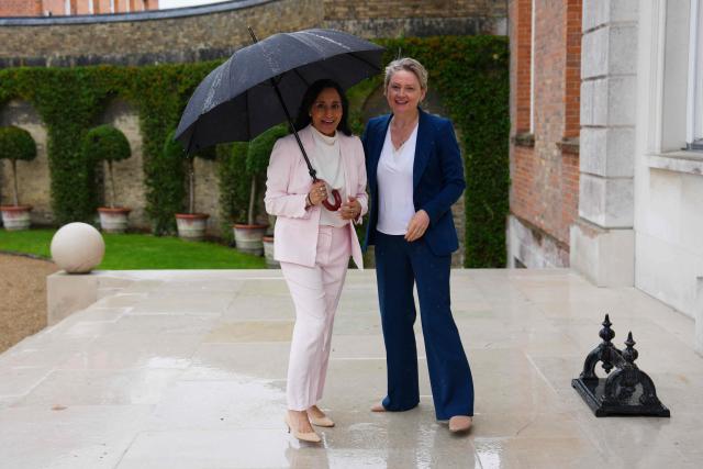 Britain's Foreign Secretary Yvette Cooper (R) welcomes Canada's Foreign Minister Anita Anand (L) at Chevening House Sevenoaks, southern England on June 11, 2026. (Photo by Carl Court / POOL / AFP)