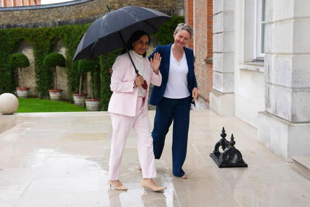 Britain's Foreign Secretary Yvette Cooper (R) welcomes Canada's Foreign Minister Anita Anand (L) at Chevening House Sevenoaks, southern England on June 11, 2026. (Photo by Carl Court / POOL / AFP)
