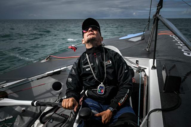 French skipper Thibaut Vauchel-Camus sails his Ocean Fify multihull Solidaires en Peloton, during a convoying from Saint-Malo to Fecamp, ahead of the Route du Rhum solo transatlantic sailing race from Saint-Malo to Pointe-a-Pitre, on June 10, 2026. The start of the 13rd edition of the Route du Rhum is scheduled for November 1, 2026. (Photo by Lou BENOIST / AFP)