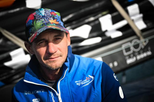 French skipper Thibaut Vauchel-Camus poses in his Ocean Fify multihull Solidaires en Peloton, during a convoying from Saint-Malo to Fecamp, ahead of the Route du Rhum solo transatlantic sailing race from Saint-Malo to Pointe-a-Pitre, on June 10, 2026. The start of the 13rd edition of the Route du Rhum is scheduled for November 1, 2026. (Photo by Lou BENOIST / AFP)