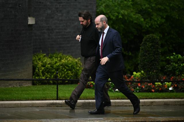 Britain's Chief Whip Jonathan Reynolds (R) arrives at 10 Downing Street in central London on June 11, 2026. British Defence Secretary John Healey resigned on Thursday, in a shock move which he blamed on Prime Minister Keir Starmer and the finance ministry failing to commit sufficient resources to defence investment. (Photo by Ben STANSALL / AFP)