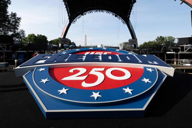A "UFC Freedom 250" logo and the structure, known as "The Claw," for the upcoming UFC fight that US President Donald Trump will host as part of the 250th anniversary of the United States is seen on the South Lawn of the White House during a media preview in Washington, DC, June 11, 2026. The Ultimate Fighting Championship (UFC) event will be held on US President Donald Trump's 80th birthday on June 14. (Photo by SAUL LOEB / AFP)