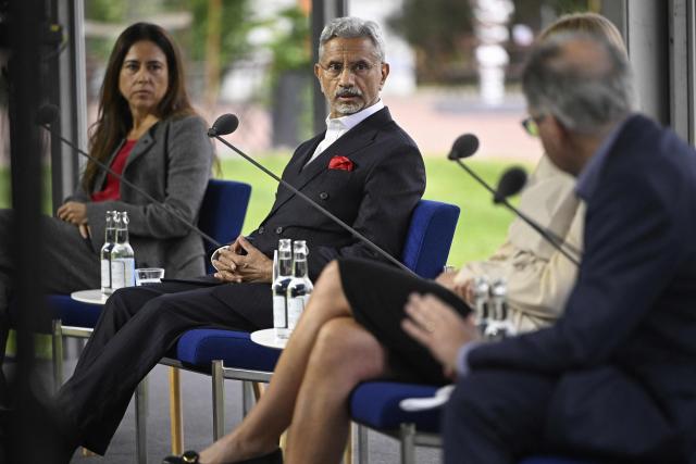 Lana Nusseibeh, Minister of State at the United Arab Emirates (L) and India's Foreign Minister Subrahmanyam Jaishankar (C) take part in the annual Kultaranta Talks at the President's summer residence Kultaranta in Naantali, Finland, on June 11, 2026. The theme of this year’s discussions on foreign and security policy is "A World in Transition - Global, Regional and Local Perspectives". (Photo by Antti Aimo-Koivisto / Lehtikuva / AFP) / Finland OUT