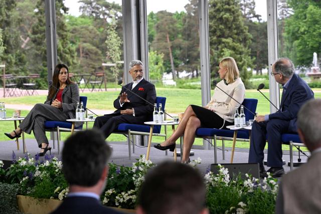 (L-R) Lana Nusseibeh, Minister of State at the United Arab Emirates, India's Foreign Minister Subrahmanyam Jaishankar, Finland's Foreign Minister Elina Valtonen and moderator Gideon Rachman take part in the annual Kultaranta Talks at the President's summer residence Kultaranta in Naantali, Finland, on June 11, 2026. The theme of this years discussions on foreign and security policy is "A World in Transition - Global, Regional and Local Perspectives". (Photo by Antti Aimo-Koivisto / Lehtikuva / AFP) / Finland OUT