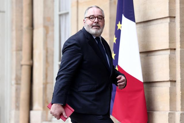 French Socialist Party senator Rachid Temal arrives for a meeting with France's Prime Minister gathering several political parties and security institutions representatives on safeguarding democratic debates against foreign interference after Paris prosecutors opened in May a probe to investigate whether an Israeli company interfered in local French elections, at the Matignon Hotel in Paris on June 11, 2026. The case was opened after several far-left candidates charged they were targeted by disinformation campaigns, as France's government body responsible for combatting online disinformation Viginum said that it had noted a "system of artificial or automated dissemination to spread manifestly inaccurate or misleading content". (Photo by Behrouz MEHRI / AFP)