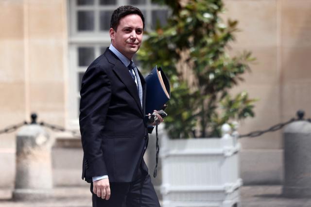 French far-right party Rassemblement National (RN) MP Yoann Gillet arrives for a meeting with France's Prime Minister gathering several political parties and security institutions representatives on safeguarding democratic debates against foreign interference after Paris prosecutors opened in May a probe to investigate whether an Israeli company interfered in local French elections, at the Matignon Hotel in Paris on June 11, 2026. The case was opened after several far-left candidates charged they were targeted by disinformation campaigns, as France's government body responsible for combatting online disinformation Viginum said that it had noted a "system of artificial or automated dissemination to spread manifestly inaccurate or misleading content". (Photo by Behrouz MEHRI / AFP)