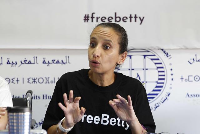 Siham Lachgar speaks on the critical health condition of her sister, Ibtissame Lachgar, during a press conference at the headquarters of the Moroccan Association for Human Rights (AMDH) in Rabat on June 11, 2026. A Moroccan court on September 3, sentenced activist Ibtissame Lachgar to 30 months behind bars for "offending Islam" by wearing a T-shirt with inscriptions deemed "blasphemous". (Photo by Abdel Majid BZIOUAT / AFP)