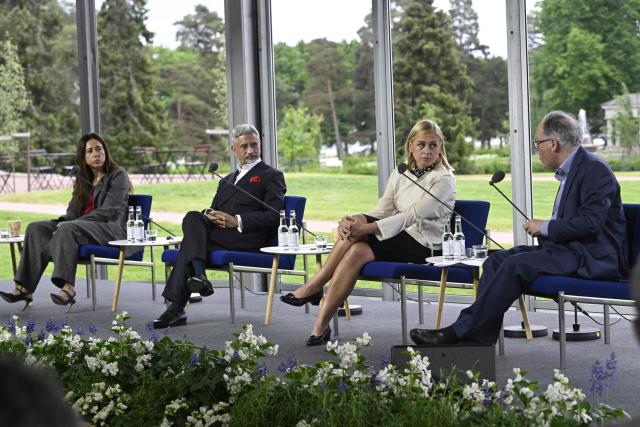 (L-R) Lana Nusseibeh, Minister of State at the United Arab Emirates, India's Foreign Minister Subrahmanyam Jaishankar, Finland's Foreign Minister Elina Valtonen and moderator Gideon Rachman take part in the annual Kultaranta Talks at the President's summer residence Kultaranta in Naantali, Finland, on June 11, 2026. The theme of this years discussions on foreign and security policy is "A World in Transition - Global, Regional and Local Perspectives". (Photo by Antti Aimo-Koivisto / Lehtikuva / AFP) / Finland OUT