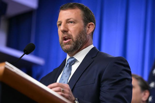 US Secretary of Homeland Security Markwayne Mullin speaks during a press conference about safeguarding unaccompanied immigrant children at the Department of Justice headquarters in Washington, DC, on June 11, 2026. (Photo by Oliver Contreras / AFP)