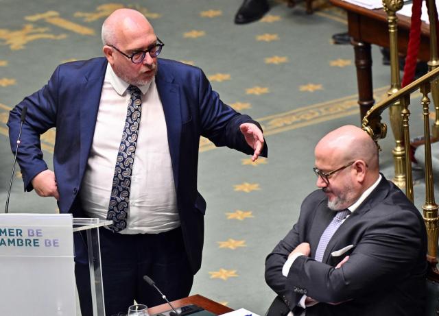 Vlaams Belang's MP Ortwin Depoortere and Belgium's Minister of Interior Bernard Quintin  attend a plenary session of the Chamber at the Federal Parliament in Brussels on June 11, 2026. (Photo by ERIC LALMAND / Belga / AFP) / Belgium OUT