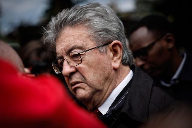 Founder of French left-wing party La France Insoumise (LFI) and presidential candidate Jean-Luc Melenchon speaks to the press at the esplanade des Invalides outside the National Assembly, France's lower house of parliament, during a demonstration in support of the nationalisation of steelmaking giant ArcelorMittal, called by the General Confederation of Labour (CGT), as the bill comes before the National Assembly in Paris on June 11, 2026. (Photo by SIMON WOHLFAHRT / AFP)