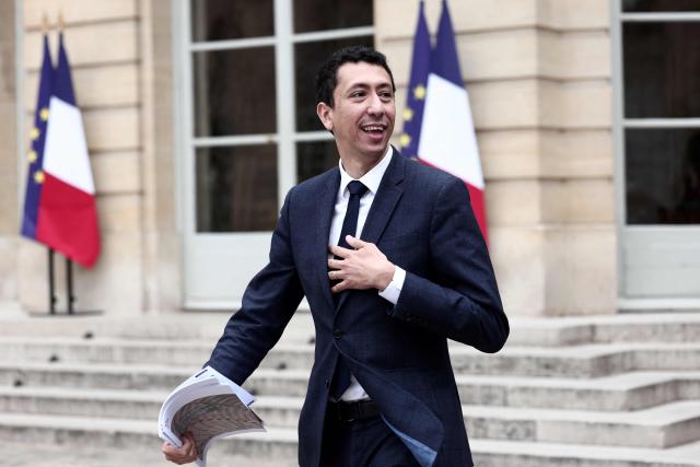 Les Republicains' General Secretary Othman Nasrou leaves after attending a meeting with France's Prime Minister gathering several political parties and security institutions representatives on safeguarding democratic debates against foreign interference after Paris prosecutors opened in May a probe to investigate whether an Israeli company interfered in local French elections, at the Matignon Hotel in Paris on June 11, 2026. The case was opened after several far-left candidates charged they were targeted by disinformation campaigns, as France's government body responsible for combatting online disinformation Viginum said that it had noted a "system of artificial or automated dissemination to spread manifestly inaccurate or misleading content". (Photo by Behrouz MEHRI / AFP)