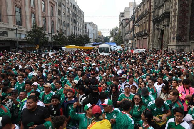 Mexican fans gather in the fan zone ahead of the 2026 World Cup football tournament Group A football match between Mexico and South Africa in Mexico City on June 11, 2026. (Photo by LUIS CORTES / AFP)