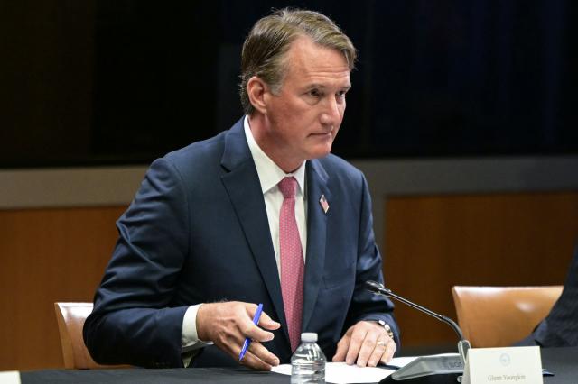 Virginia Governor Glenn Youngkin attends a round table discussion hosted by Acting Attorney General Todd Blanche on "exposing weaponization against parents in schools" at the Department of Justice headquarters in Washington, DC, on June 11, 2026. (Photo by Oliver Contreras / AFP)