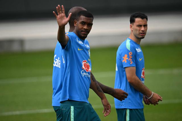 Brazil's forward #26 Rayan (L) waves during a training session during the 2026 World Cup football tournament at Columbia Park Training Facility in Morristown, New Jersey, on June 11, 2026. (Photo by MAURO PIMENTEL / AFP)