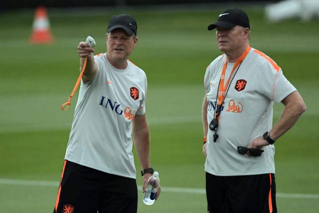 Netherlands' head coach Ronald Koeman (R) listen to his assistant Erwin Koeman during a training session during the 2026 World Cup football tournament at KC Current Training Facility in Kansas City on June 11, 2026. (Photo by JUAN MABROMATA / AFP)