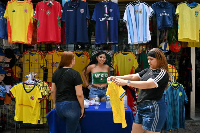Jerseys are for sale in a neighborhood in the Queens borough of New York City on opening day of the 2026 World Cup football tournament on June 11, 2026. (Photo by ANGELA WEISS / AFP)