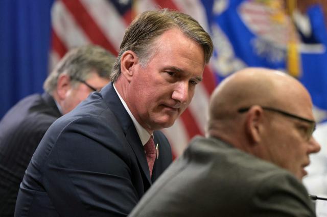 Virginia Governor Glenn Youngkin attends a round table discussion hosted by Acting Attorney General Todd Blanche on "exposing weaponization against parents in schools" at the Department of Justice headquarters in Washington, DC, on June 11, 2026. (Photo by Oliver Contreras / AFP)