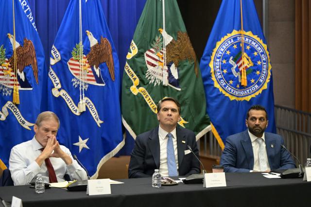 (L/R) US Representative Jim Jordan, Republican of Ohio, Acting US Attorney Todd Blanche and FBI Director Kash Patel attend a round table discussion on "exposing weaponization against parents in schools" at the Department of Justice headquarters in Washington, DC, on June 11, 2026. (Photo by Oliver Contreras / AFP)