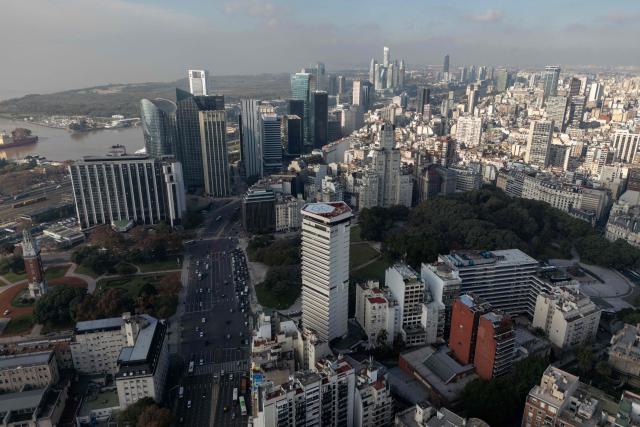 An aerial view shows the financial district skyline in Buenos Aires on June 11, 2026. (Photo by Luis ROBAYO / AFP)