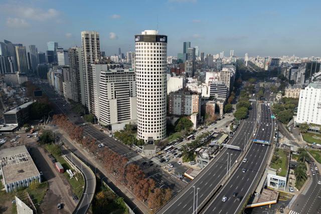 An aerial view shows the financial district skyline in Buenos Aires on June 11, 2026. (Photo by Luis ROBAYO / AFP)