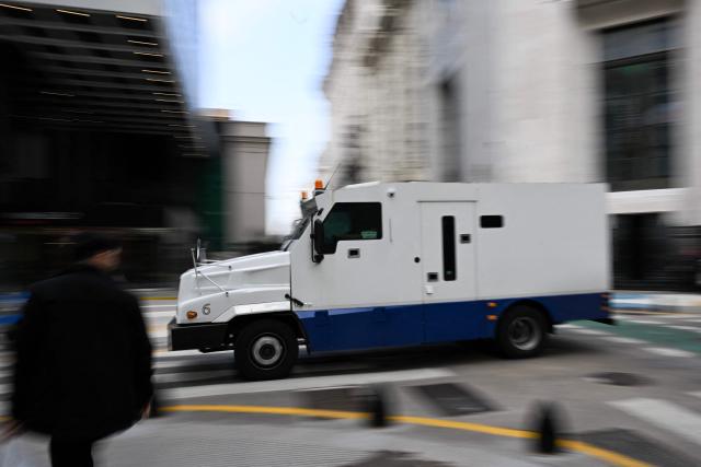 An armored truck drives along a street in Buenos Aires on June 11, 2026. (Photo by Luis ROBAYO / AFP)