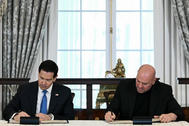 (L/R) US Secretary of State Marco Rubio  and UFC President and CEO Dana White participate in a Memorandum of Understanding signing ceremony at the State Department in Washington, DC, on June 11, 2026. According to the State Department, the new partnership aims to "enhance sports diplomacy initiatives and collaborate on the global growth of mixed martial arts." (Photo by Brendan SMIALOWSKI / AFP)