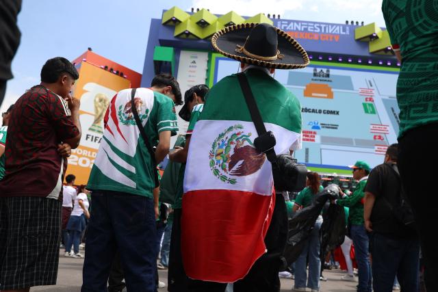 Mexican fans gather in the fan zone ahead of the 2026 World Cup football tournament Group A football match between Mexico and South Africa in Mexico City on June 11, 2026. (Photo by LUIS CORTES / AFP)