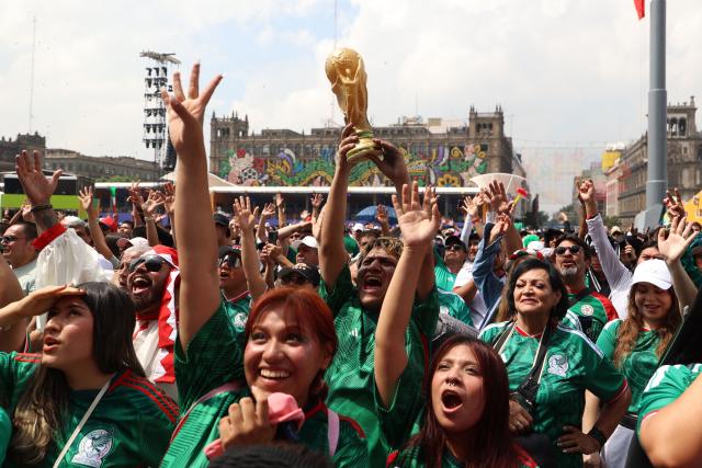 Mexican fans cheer for their team in the fan zone ahead of the 2026 World Cup football tournament Group A football match between Mexico and South Africa in Mexico City on June 11, 2026. (Photo by LUIS CORTES / AFP)
