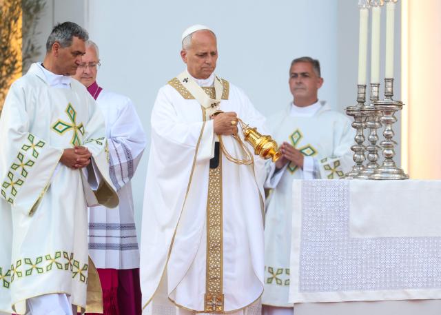 Pope Leo XIV leads a Holy mass at the Gran Canaria Stadium in Las Palmas on the Canary Island of Gran Canaria on June 11, 2026. Pope Leo XIV is visiting Spain June 6-12 with stops in Madrid, Barcelona, and the Canary Islands, where he will meet with migrants and organisations dedicated to helping them. (Photo by Pierre-Philippe MARCOU / AFP)