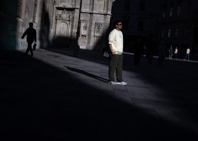 Pedestrians walk past Saint Stephen’s cathedral during the late afternoon light, in Vienna, on June 11, 2026. (Photo by Joe Klamar / AFP)