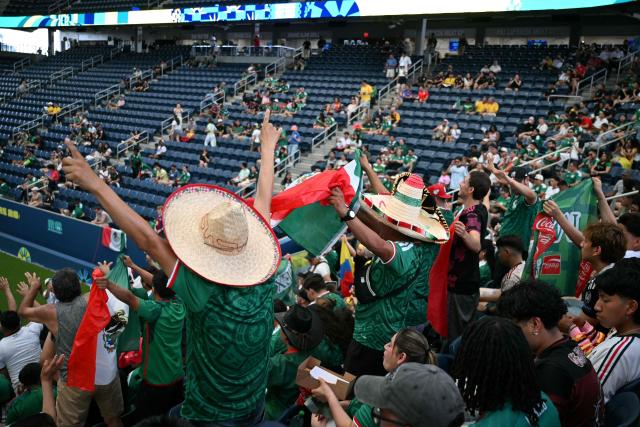 Mexican fans cheer at a watch party before the opening match of the 2026 World Cup football tournament at the "Queens Group Stage HQ" at USTA Billie Jean King National Tennis Center in New York on June 11, 2026. (Photo by ANGELA WEISS / AFP)