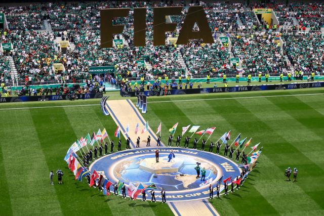 Italian singer Andrea Bocelli and South Korean-American singer and songwriter Ejae perform during the opening ceremony ahead of the 2026 World Cup Group A football match between Mexico and South Africa at the Mexico City Stadium in Mexico City on June 11, 2026. (Photo by Rodrigo OROPEZA / AFP)