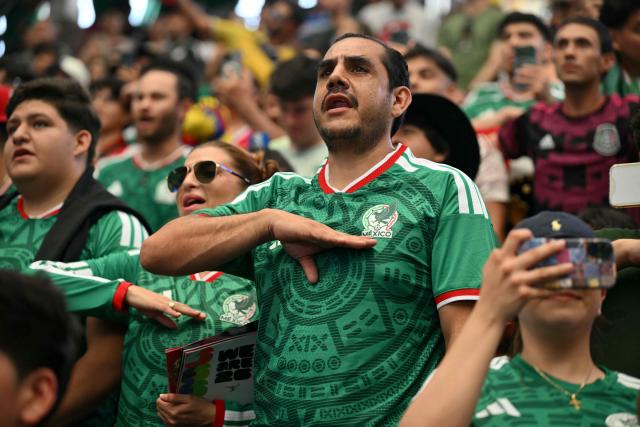Fans sing the Mexican national anthem at a watch party before the opening match of the 2026 World Cup football tournament at the "Queens Group Stage HQ" at USTA Billie Jean King National Tennis Center in New York on June 11, 2026. (Photo by ANGELA WEISS / AFP)