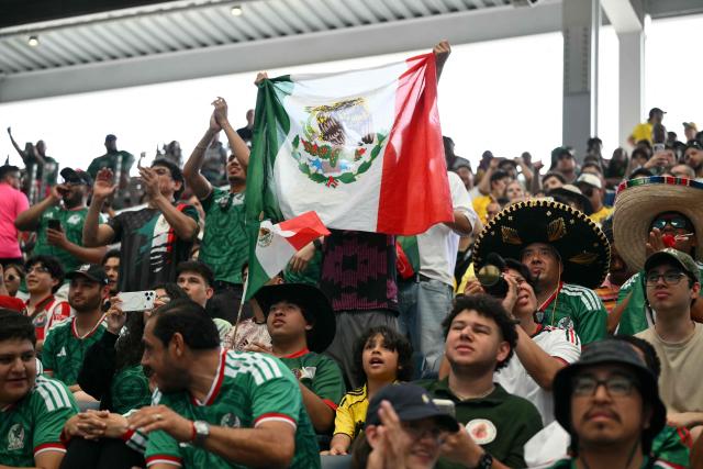 Mexican fans cheer at a watch party before the opening match of the 2026 World Cup football tournament at the "Queens Group Stage HQ" at USTA Billie Jean King National Tennis Center in New York on June 11, 2026. (Photo by ANGELA WEISS / AFP)