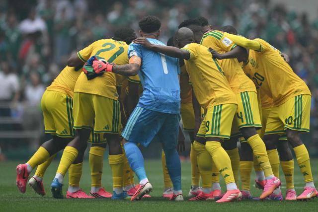 South Africa's players gather in a circle at the start of the 2026 World Cup Group A football match between Mexico and South Africa at the Mexico City Stadium in Mexico City on June 11, 2026. (Photo by Yuri CORTEZ / AFP)