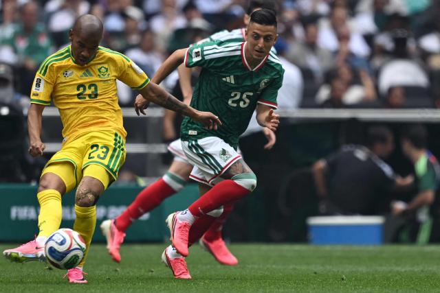 South Africa's midfielder #23 Jayden Adams and Mexico's midfielder #25 Roberto Alvarado fight for the ball during the 2026 World Cup Group A football match between Mexico and South Africa at the Mexico City Stadium in Mexico City on June 11, 2026. (Photo by Yuri CORTEZ / AFP)