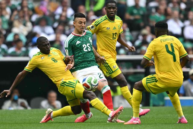 South Africa's defender #06 Aubrey Modiba, Mexico's midfielder #25 Roberto Alvarado, South Africa's midfielder #13 Sphephelo Sithole and South Africa's midfielder #04 Teboho Mokoena fight for the ball during the 2026 World Cup Group A football match between Mexico and South Africa at the Mexico City Stadium in Mexico City on June 11, 2026. (Photo by Yuri CORTEZ / AFP)
