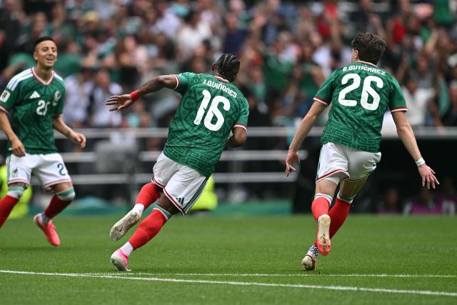 Mexico's forward #16 Julian Quinones celebrates scoring his team's first goal next to teammate midfielder #26 Brian Gutierrez during the 2026 World Cup Group A football match between Mexico and South Africa at the Mexico City Stadium in Mexico City on June 11, 2026. (Photo by Yuri CORTEZ / AFP)