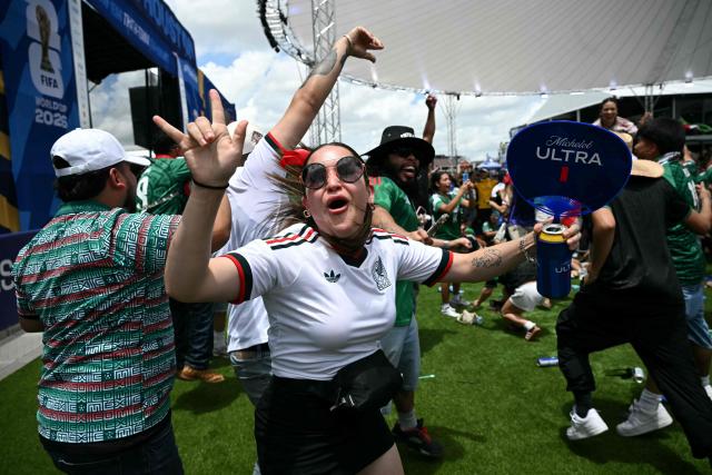 Mexican fans cheer at a watch party before the opening match of the 2026 World Cup football tournament at the FIFA Fan Zone in Houston, Texas, on June 11, 2026. (Photo by RONALDO SCHEMIDT / AFP)