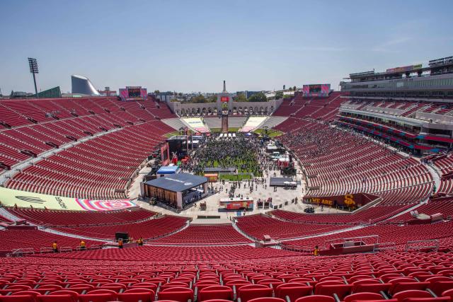 A general view shows the LA Memorial Coliseum as fans arrive for the FIFA Fan Festival to watch the match between Mexico and South Africa on opening day of the 2026 World Cup football tournament at in Los Angeles on June 11, 2026. Mexico and South Africa are opening the 2026 World Cup football tournament Group A, in Mexico City. (Photo by Apu GOMES / AFP)
