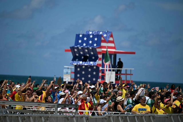 Fans a watch party for the opening match of the 2026 World Cup football tournament in Miami Beach, Florida, on June 11, 2026. (Photo by CHANDAN KHANNA / AFP)