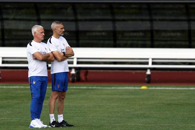 France coach Didier Deschamps (L) takes part in a training session during the 2026 World Cup football tournament at Bentley University in Waltham, Boston on June 11, 2026. (Photo by FRANCK FIFE / AFP)