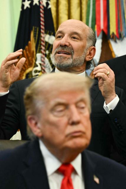 US President Donald Trump listens as US Commerce Secretary Howard Lutnick speaks before Trump signs a proclamation in the Oval Office of the White House in Washington, DC, on June 11, 2026. (Photo by Kent NISHIMURA / AFP)