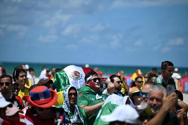 Fans a watch party for the opening match of the 2026 World Cup football tournament in Miami Beach, Florida, on June 11, 2026. (Photo by CHANDAN KHANNA / AFP)