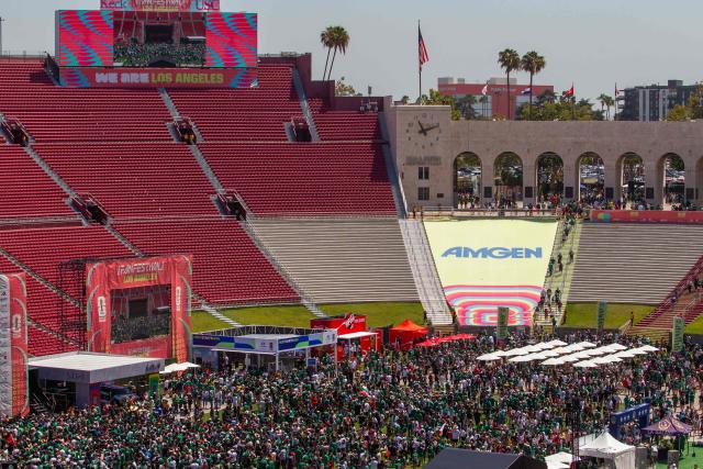 A general view shows the LA Memorial Coliseum as fans arrive for the FIFA Fan Festival to watch the match between Mexico and South Africa on opening day of the 2026 World Cup football tournament at in Los Angeles on June 11, 2026. Mexico and South Africa are opening the 2026 World Cup football tournament Group A, in Mexico City. (Photo by Apu GOMES / AFP)