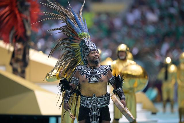 An artist performs during the opening ceremony ahead of the 2026 World Cup Group A football match between Mexico and South Africa at the Mexico City Stadium in Mexico City on June 11, 2026. (Photo by Alfredo ESTRELLA / AFP)